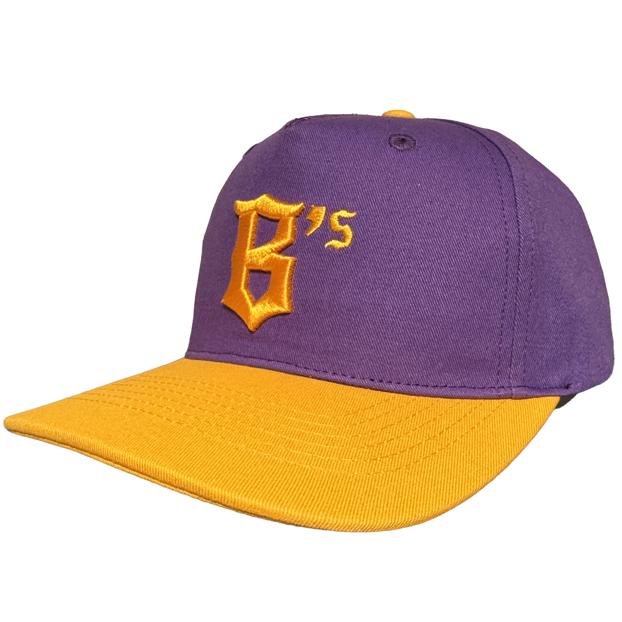 Here’s a rewritten version using your product data: A purple Oakland Ballers 5 Panel Cap featuring a yellow brim and top button. The front displays a yellow embroidered “B’s” in stylized text, representing the Oakland Ballers baseball team. The background is plain white.