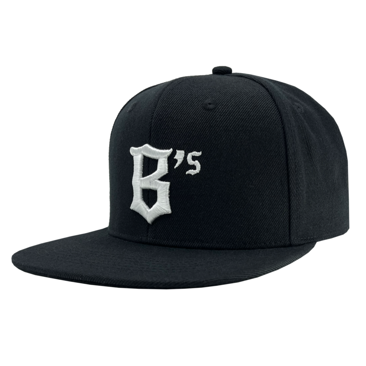 Side angled view of a black ball cap with Oakland Ballers B embroidered on the front crown.