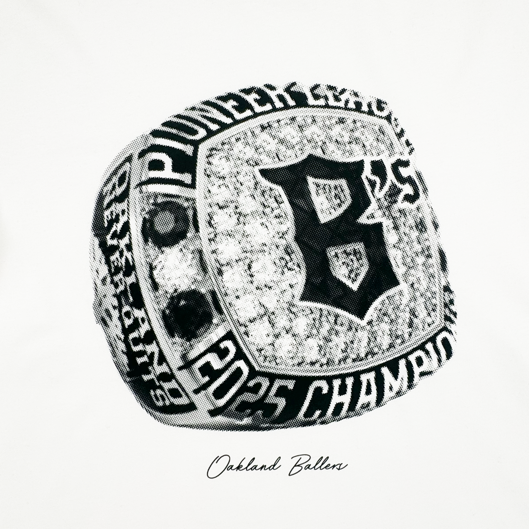 Black and white image of the Triumph Tee by Oakland Ballers. The design features a jeweled championship ring with a "B" and "Pioneer League Champions," celebrating the team as 2025 DEV GRANTS champions.