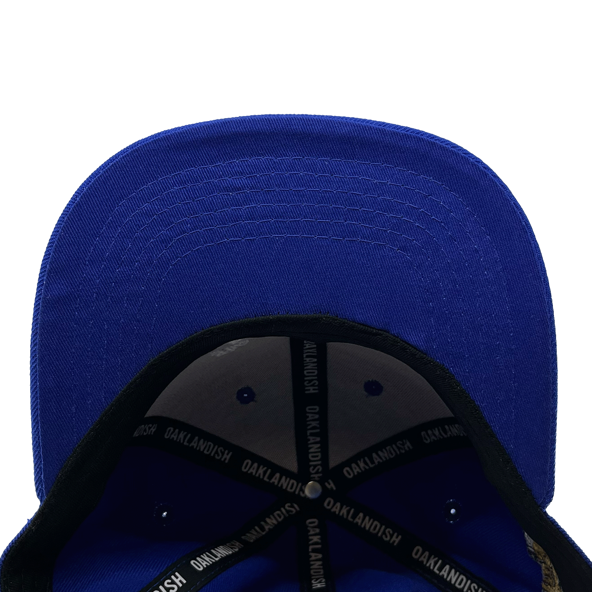 The underside view of a royal blue square flat bill in a blue hat.
