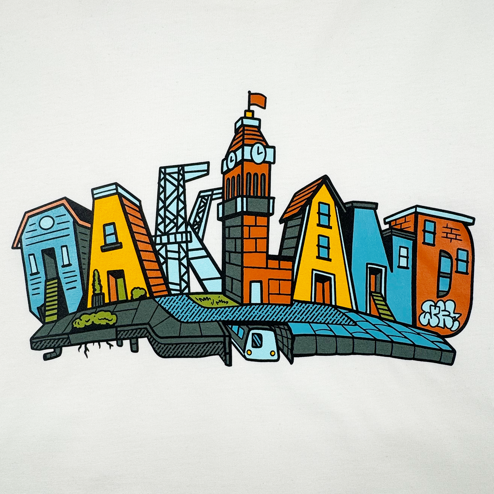 The Oaklandish Blockletters Tee features a colorful cityscape spelling "OAKLAND," with each letter as a landmark. A clock tower forms the "L," and a subway train, greenery, and graffiti capture the city's vibrant urban spirit.
