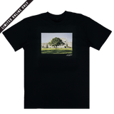 Black t-shirt with signed photographic image of a tree with a building behind and limited edition banner.