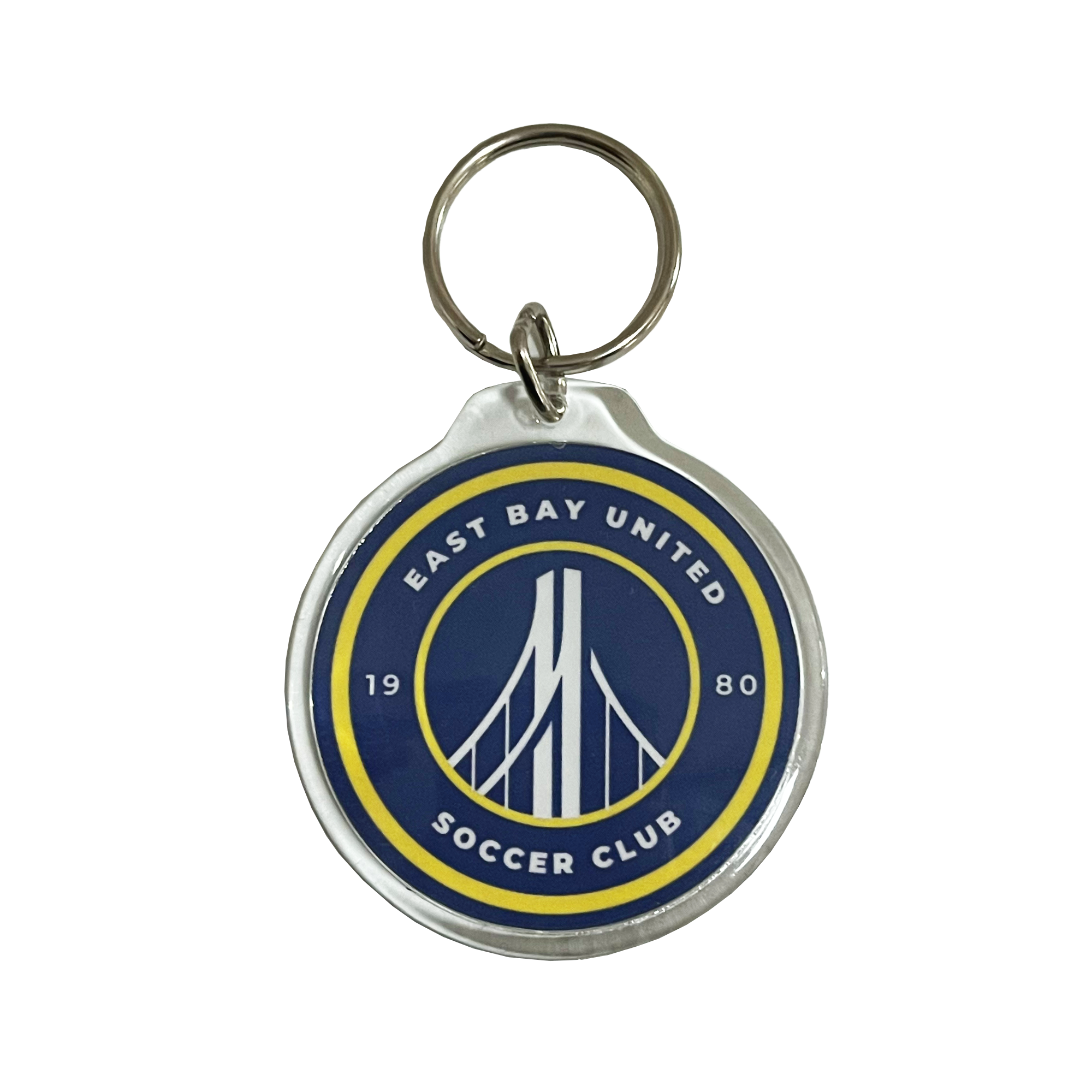 Metal key chain with blue and yellow logo of the the East Bay United Soccer Club,.