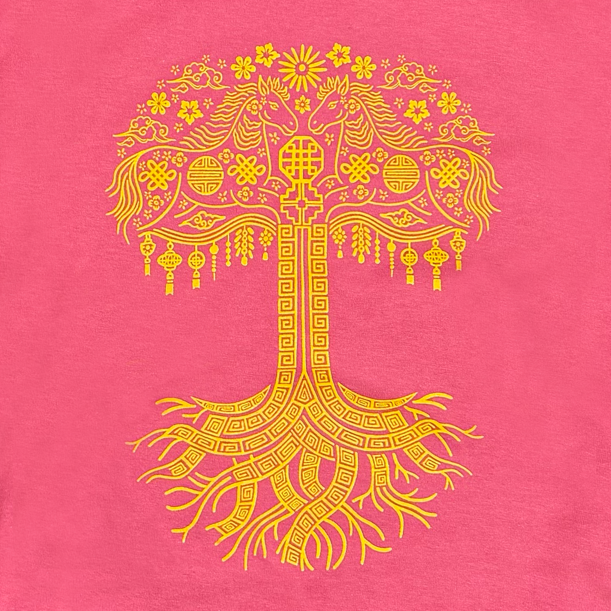 The Oaklandish Women's Fire Horse Tee features a stylized yellow tree with unicorns, ornate roots, floral patterns, lanterns, and circles on a pink background—an eye-catching vintage red tee to celebrate the Year of the Fire Horse.