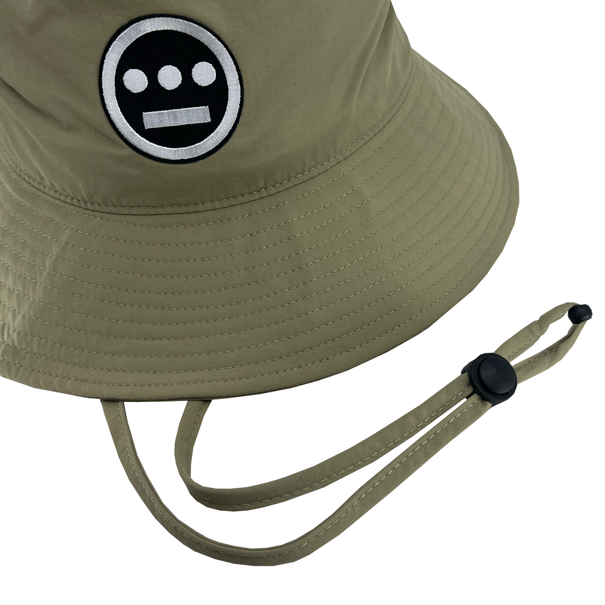 Detailed view of wide brim Khaki bucket hat with toggles and Hiero logo patch .