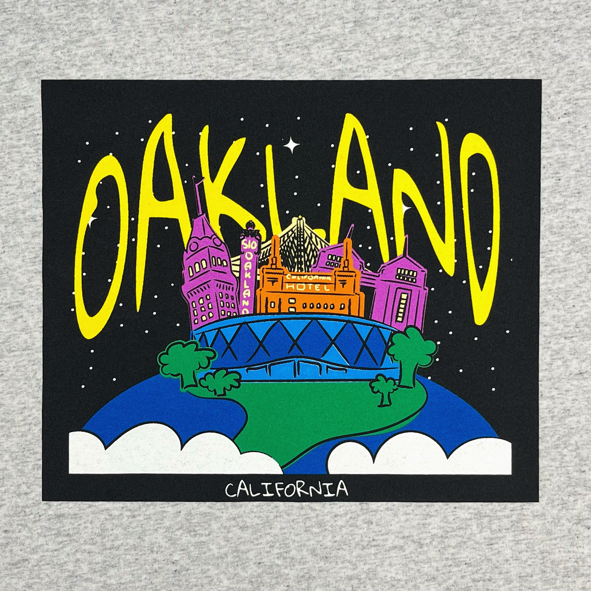 Detailed close up of Ash grey cotton t-shirt with Oakland graphic of landmarks.