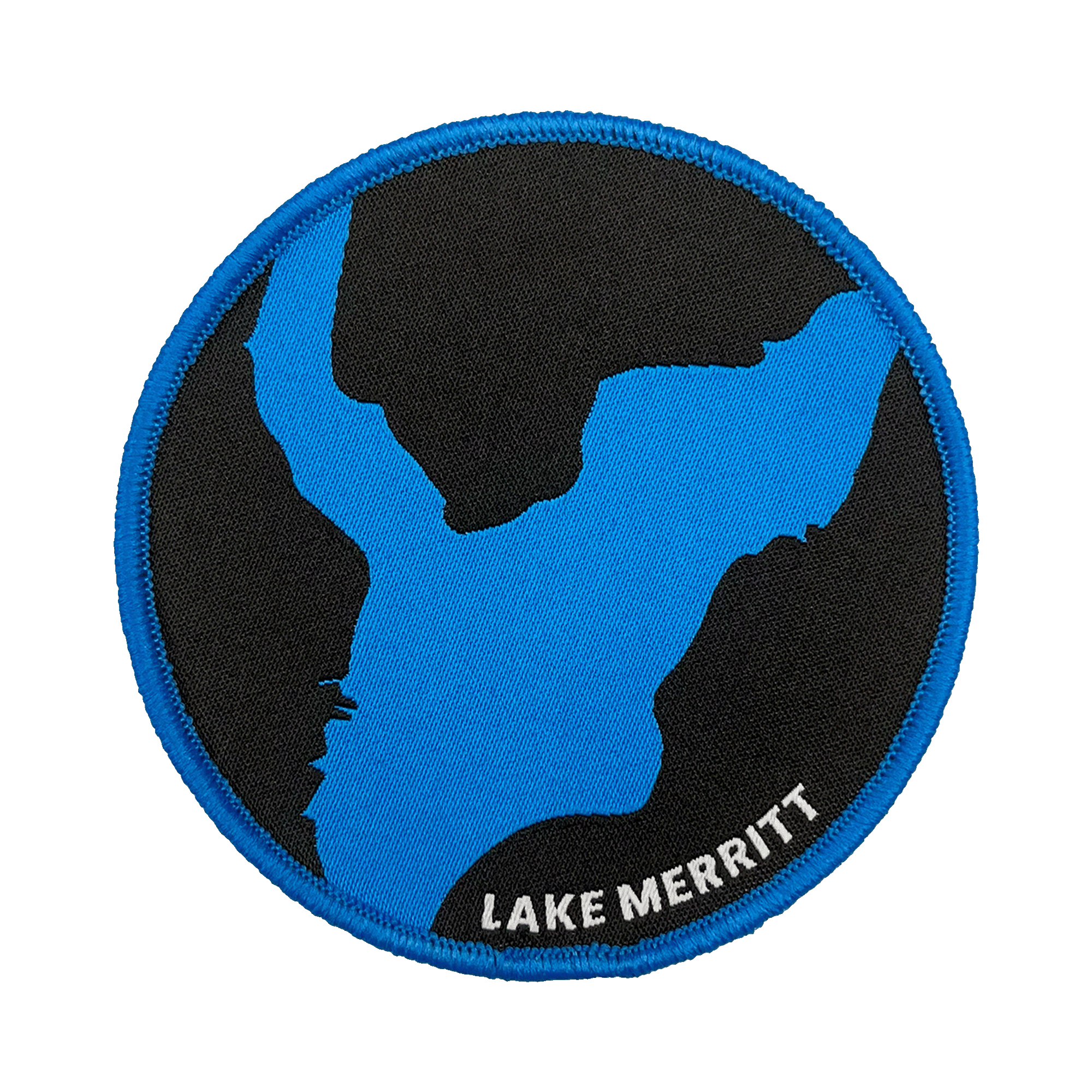 Black woven iron-on patch with blue outline of Oakland's Lake Merritt & Lake Merritt wordmark.