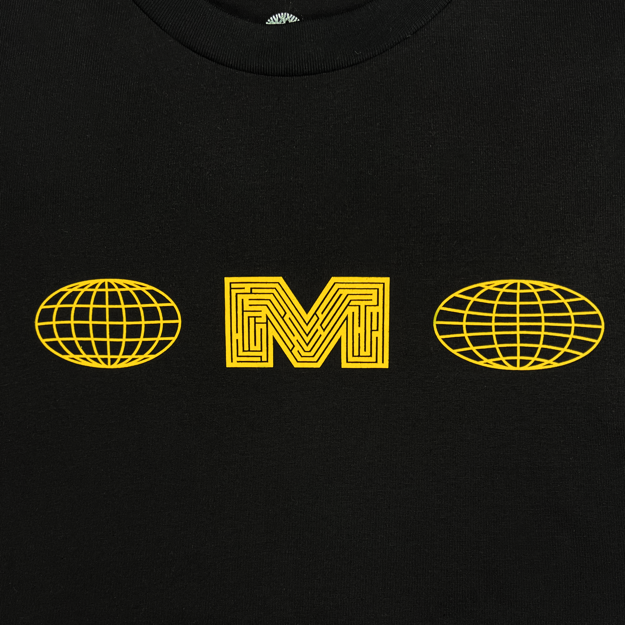Front detail of black long sleeve t-shirt with Macarthur Maze  logo.