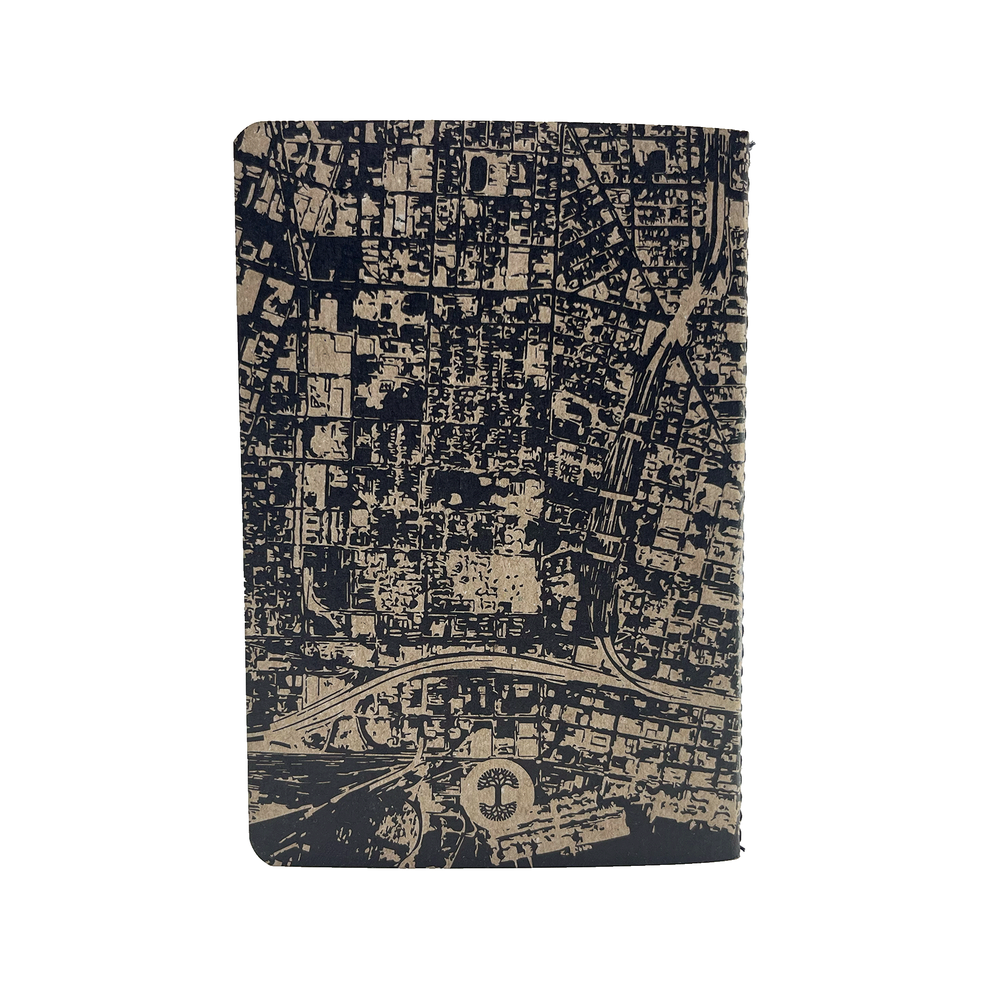 The Aerial Map Mini Notebook by Never Elsewhere features a detailed urban map printed on its cover, showcasing streets, buildings, and other infrastructure in dark ink on a light background. This rectangular mini notebook has rounded corners and contains dot grid paper inside, making it appear medium-sized.