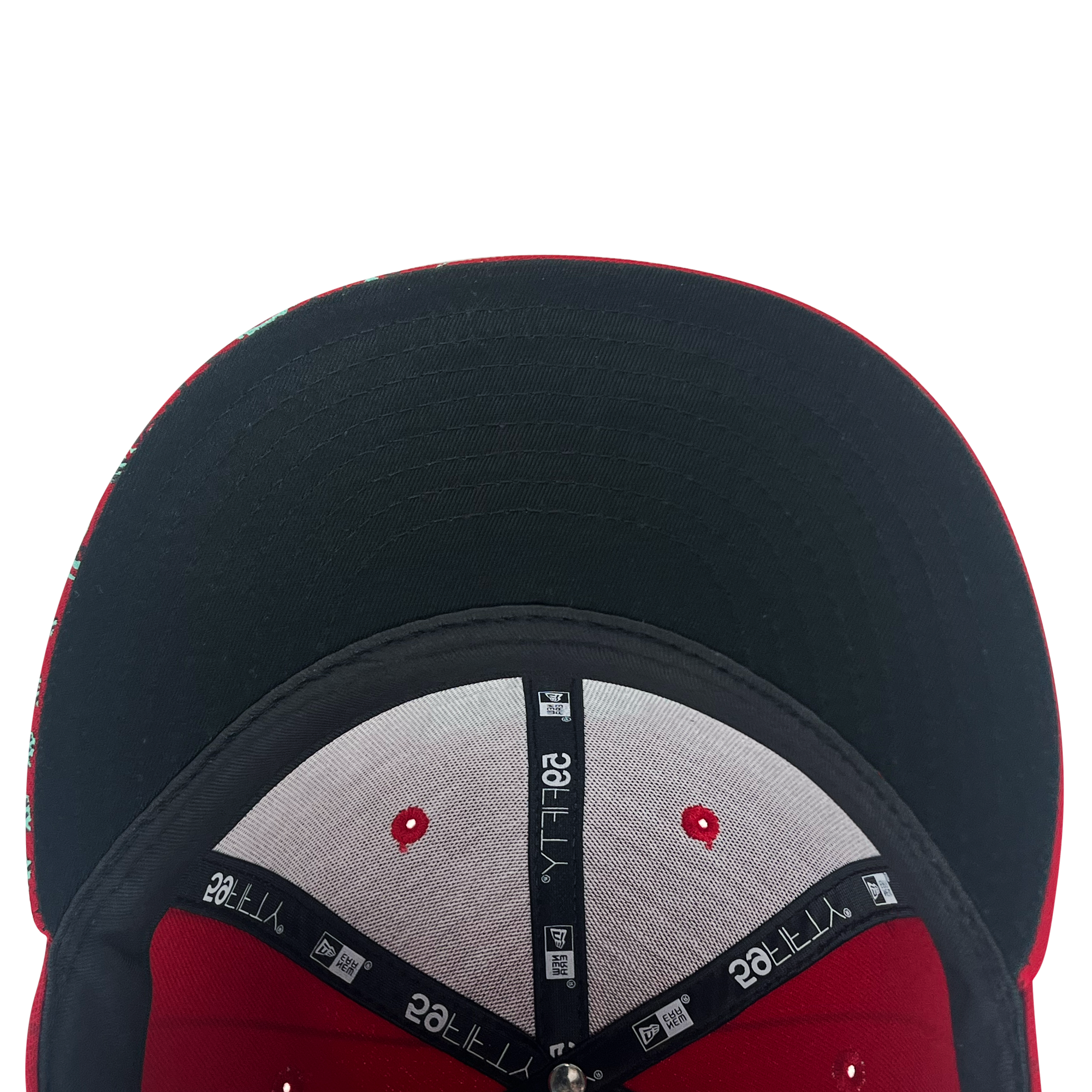 Close-up of the interior of a red and black Retail Vendors New Era Diablos Pinstripe 59FIFTY fitted cap. The underside of the black brim features black seam tapes with white "New Era" logos and labels. The interior includes a grey panel with red accents, including two ventilation holes, and a "59FIFTY" label is visible inside.