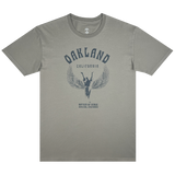Front view of a dust-colored t-shirt with Oakland California graphic celebrating Isadora Duncan, pioneer of modern dance.