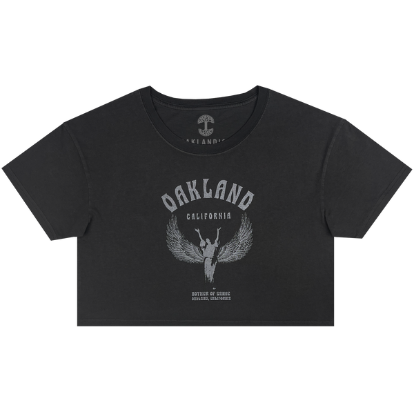 Front view of a faded black cropped women’s t-shirt with Oakland California graphic celebrating Isadora Duncan, pioneer of modern dance.