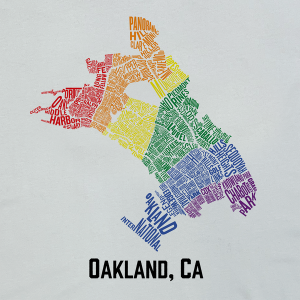 Close-up of rainbow graphic of Oakland neighborhood map & Oakland CA wordmark on a white t-shirt.