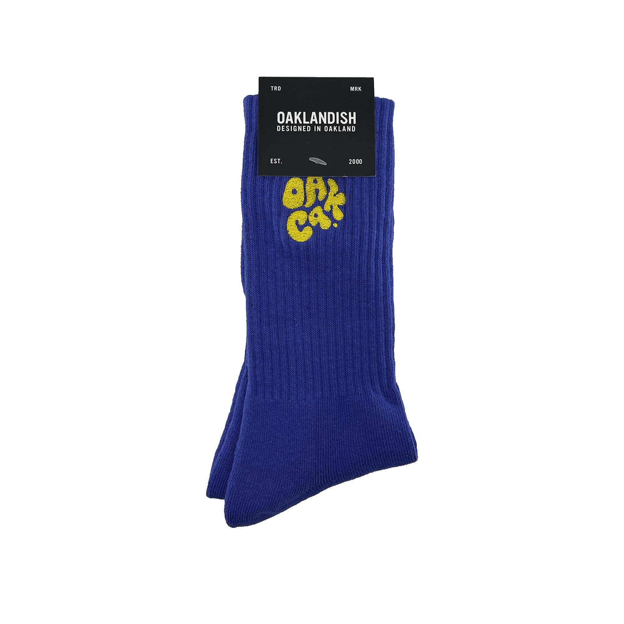 Pair folded blue crew socks in Oaklandish packaging with an embroidered yellow OAK CA blob-style wordmark.