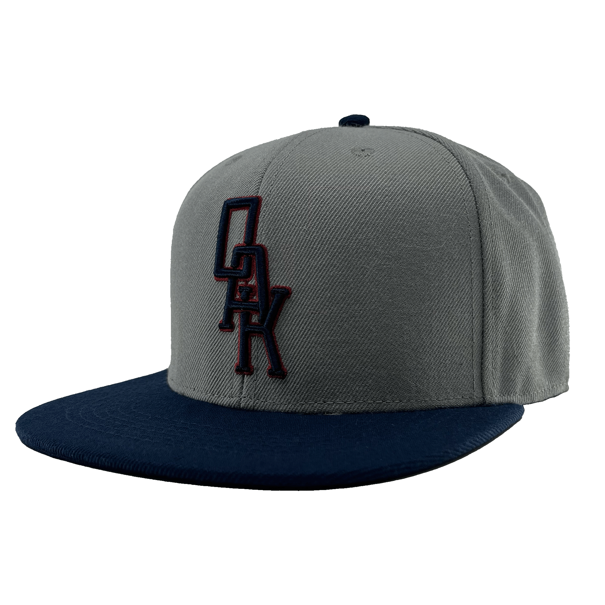 Angled side view of a grey hat with navy bill and navy and red embroidered OAK logo on the front crown.