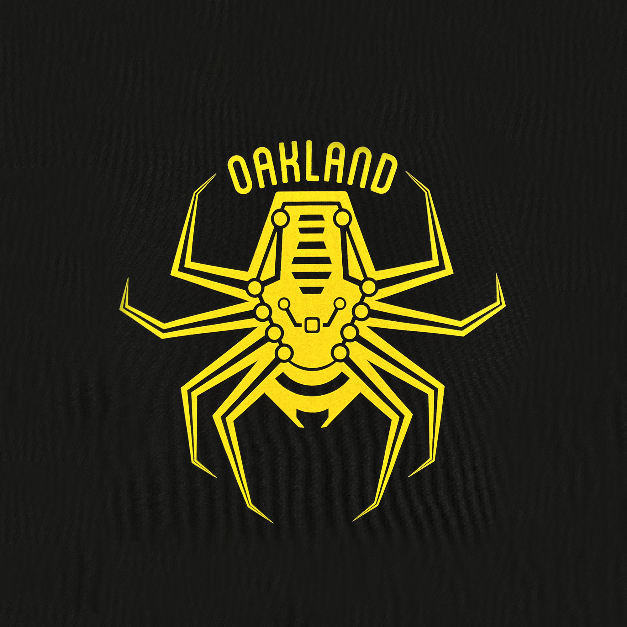 The Oakland Spiders Logo Zip by Supported Brands features a striking yellow geometric spider design set against a black background. The spider, with its angular legs and body made up of various geometric shapes, exudes a robotic vibe that perfectly symbolizes Oakland's ultimate frisbee youth development team. Above the spider is "Oakland Spiders" in bold, uppercase letters, completing this dynamic logo.