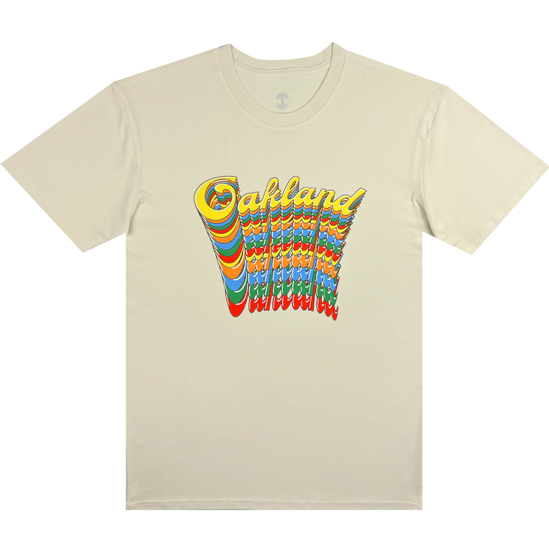 Natural cotton color t-shirt with Oakland wordmark in script on repeat in rainbow color on front chest.