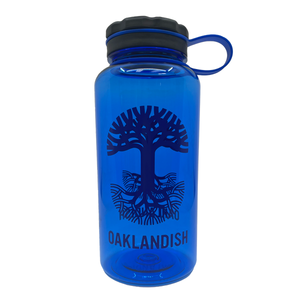  Wide mouth, screw top 32oz Nalgene water bottle with Oaklandish Logo in royal blue.