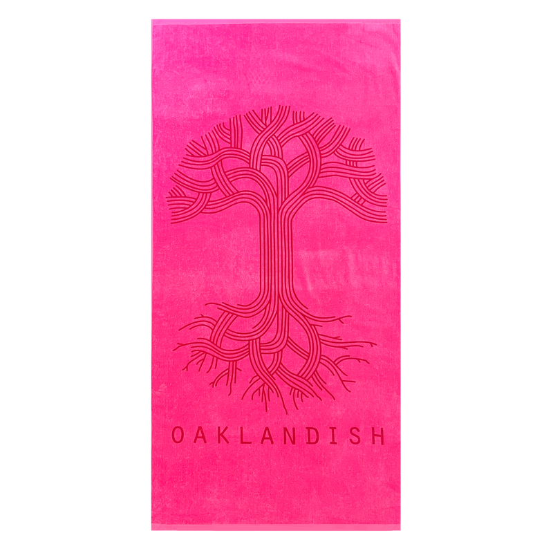 Oversized bright pink plush beach with classic Oaklandish logo and wordmark.