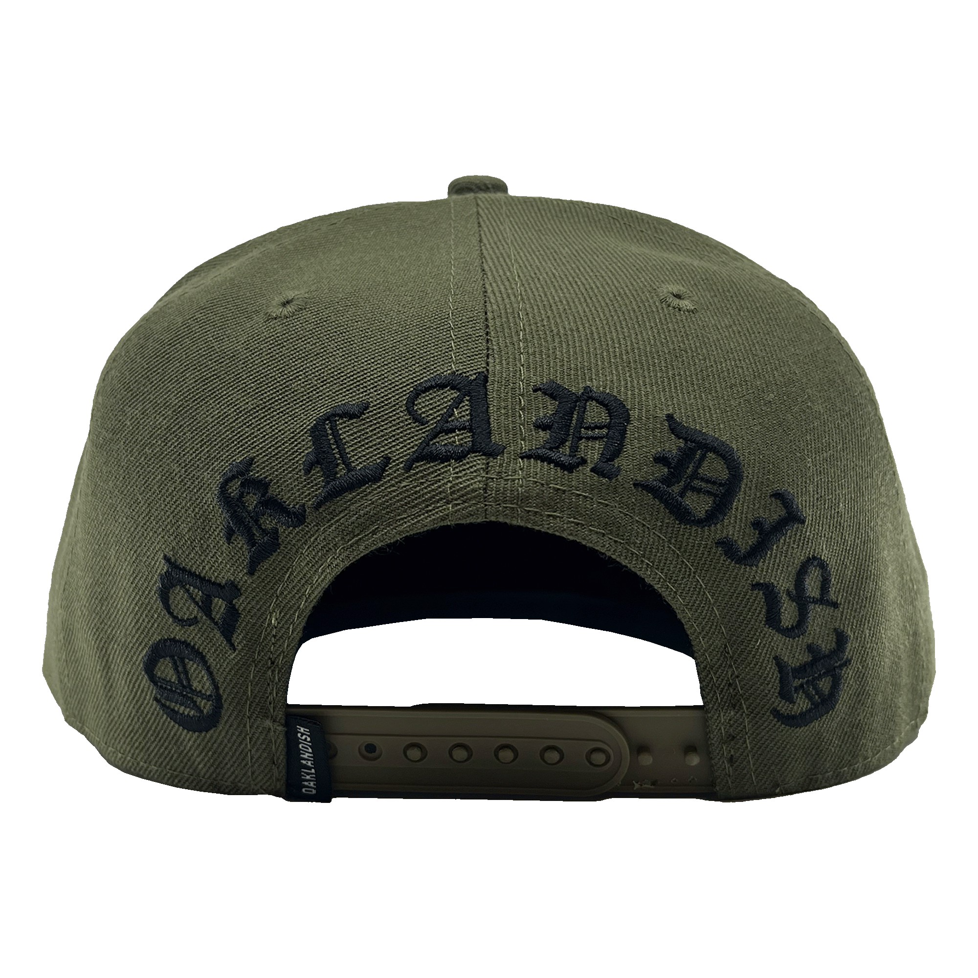 The Old English Aft Snapback by Oaklandish, showcased from the rear, features an adjustable strap and the word "OAKLANDISH" embroidered in a black Gothic-style font. The green cap includes a small black tag with white text near the strap and an Oaklandish tree logo. The fabric texture is also visible, highlighting its durable material.