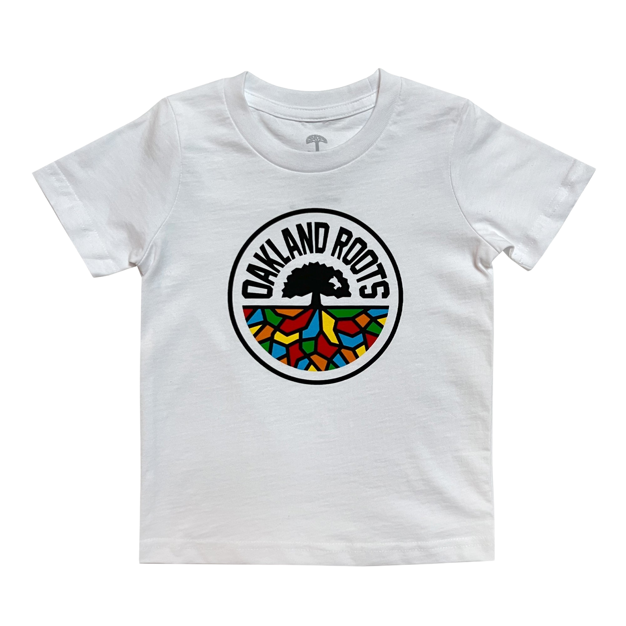 The Toddler Oakland Roots SC Classic Tee by Oakland Roots SC is a white, short-sleeve t-shirt that showcases the "Oakland Roots" logo at its center. The black tree with roots is surrounded by colorful, stained glass-like sections in red, green, yellow, and blue. Above the tree, "OAKLAND ROOTS" is elegantly arched. It's an ideal choice for any young fan of the Oaklandish sports club.