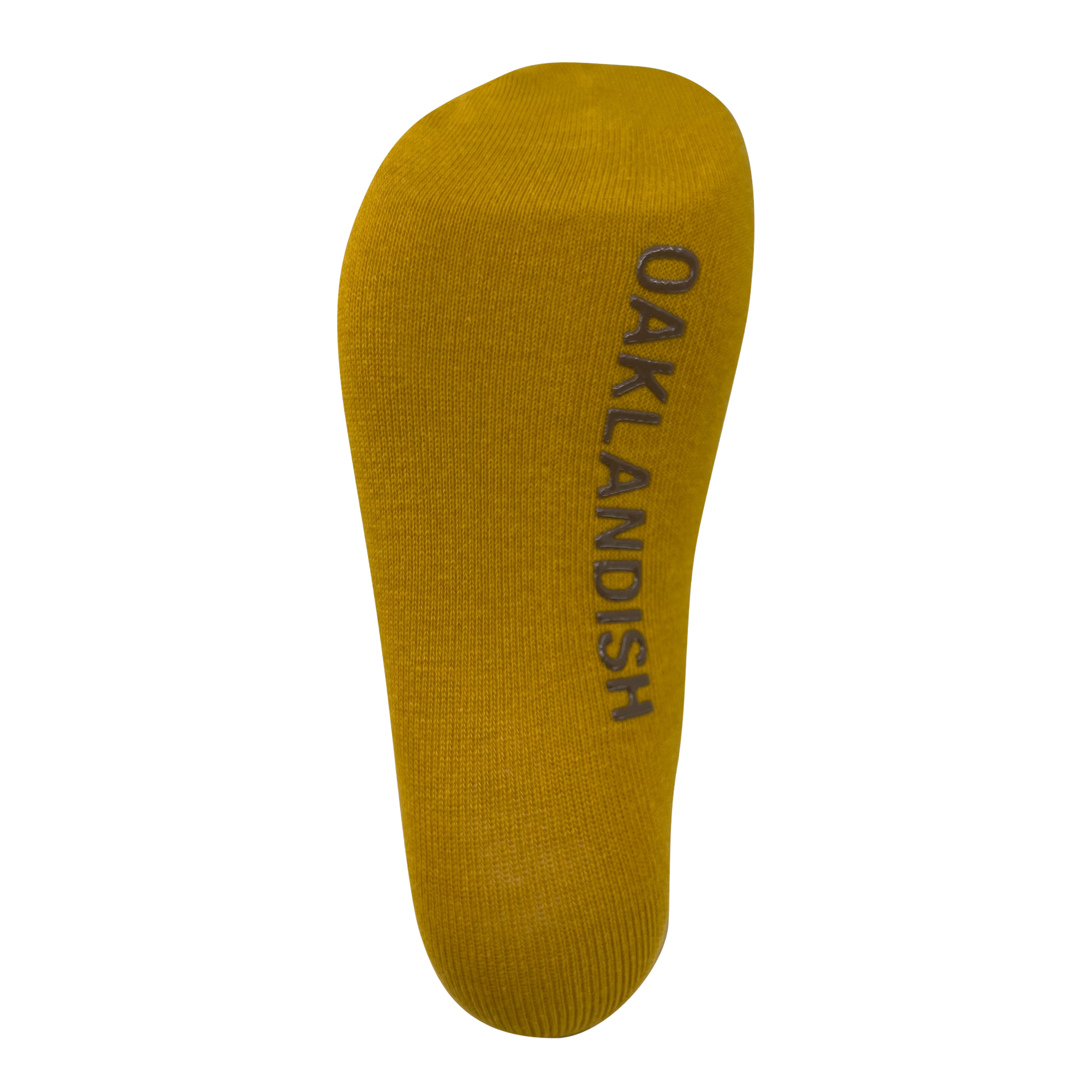 A single yellow sock is shown with the word "OAKLANDISH" printed in black along the length of the sole. The Oaklandish Grip Crew Sock, made from a blend of cotton, polyester, and spandex, is displayed against a white background and appears new and unworn.