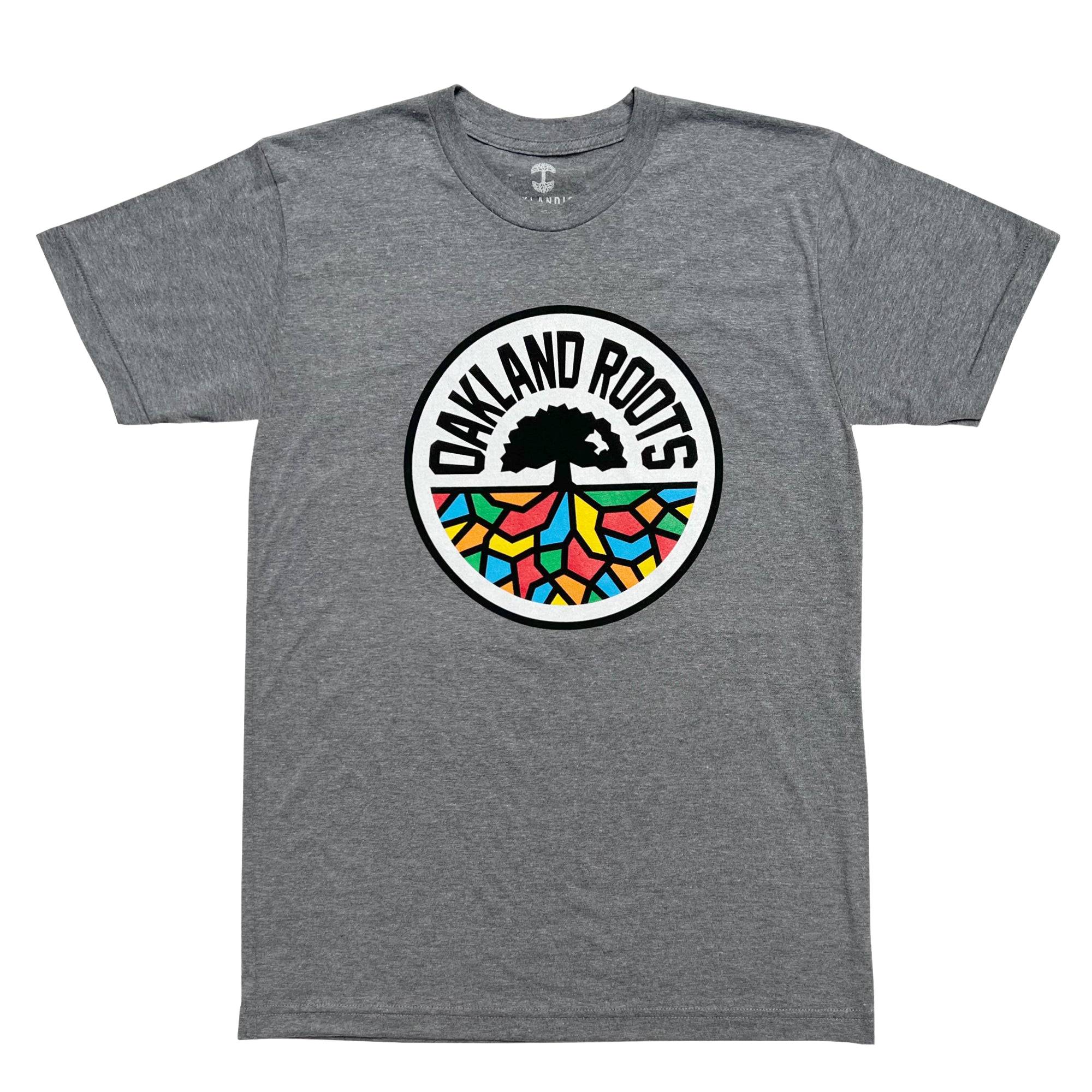 The Oakland Roots SC Classic Tee by Oakland Roots SC features a striking design with a large circular logo at the center. The logo showcases a black tree silhouetted against a vibrant multicolored mosaic background, encircled by the bold text "OAKLAND ROOTS" in black, representing this distinctive sports club. The gray t-shirt comes with short sleeves and a classic crew neckline.