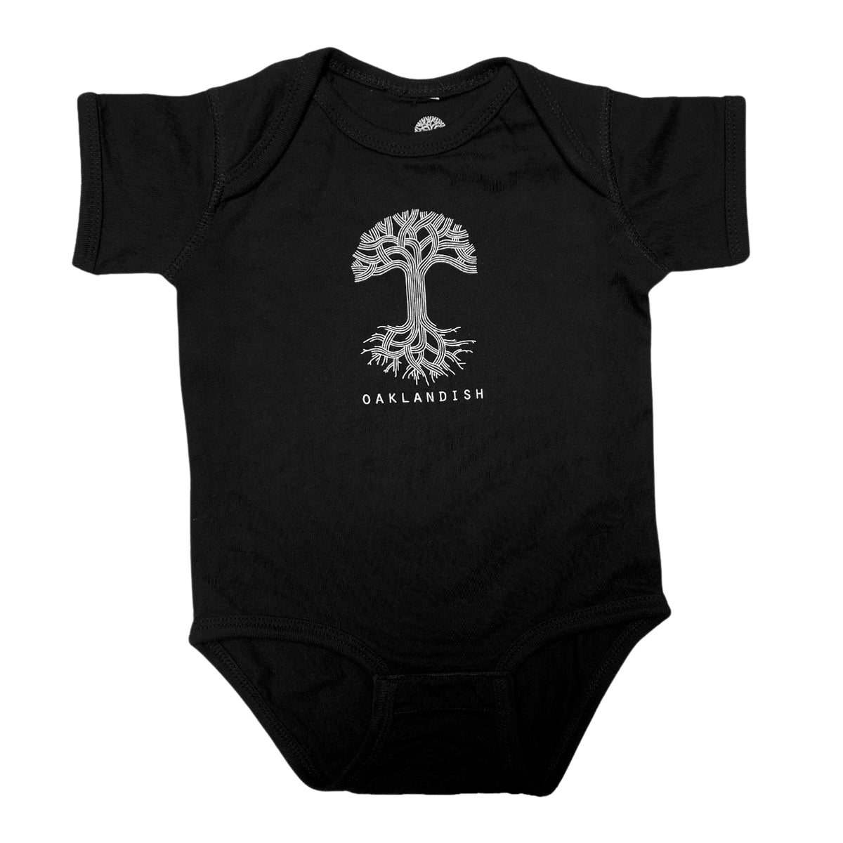 The Infant Oaklandish Classic Logo One-Piece by Oaklandish is a black baby romper showcasing a stylized silver tree with spreading roots and branches at its center. Below the tree, "OAKLANDISH" is written in capital letters. Made from 100% cotton, this onesie features a round neckline, short sleeves, and a reinforced snap closure for easy changes.