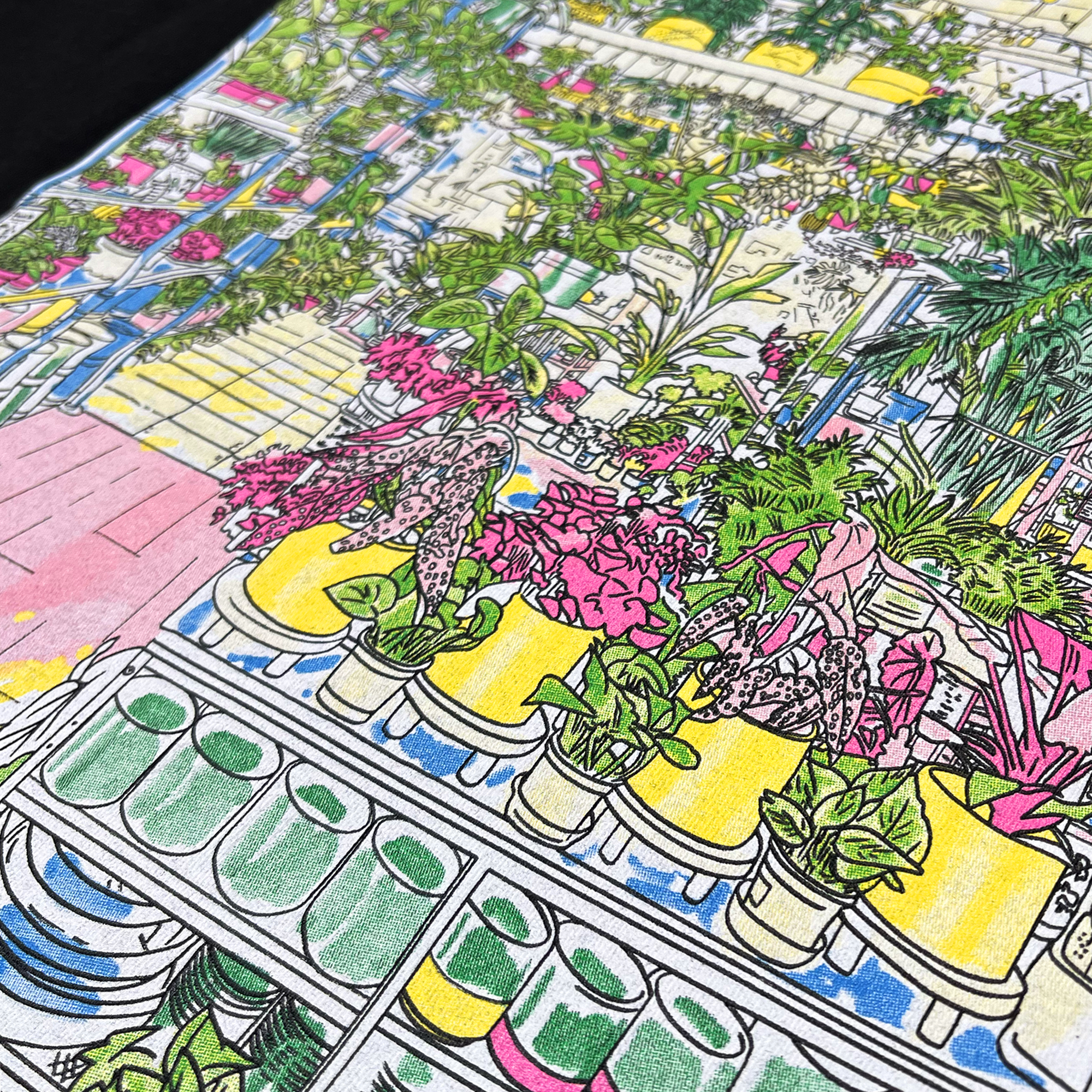Detailed close-up of large hand-drawn full color graphic of the inside of Planterday, a mission-driven plant shop in Oakland, CA, on a black cotton t-shirt.