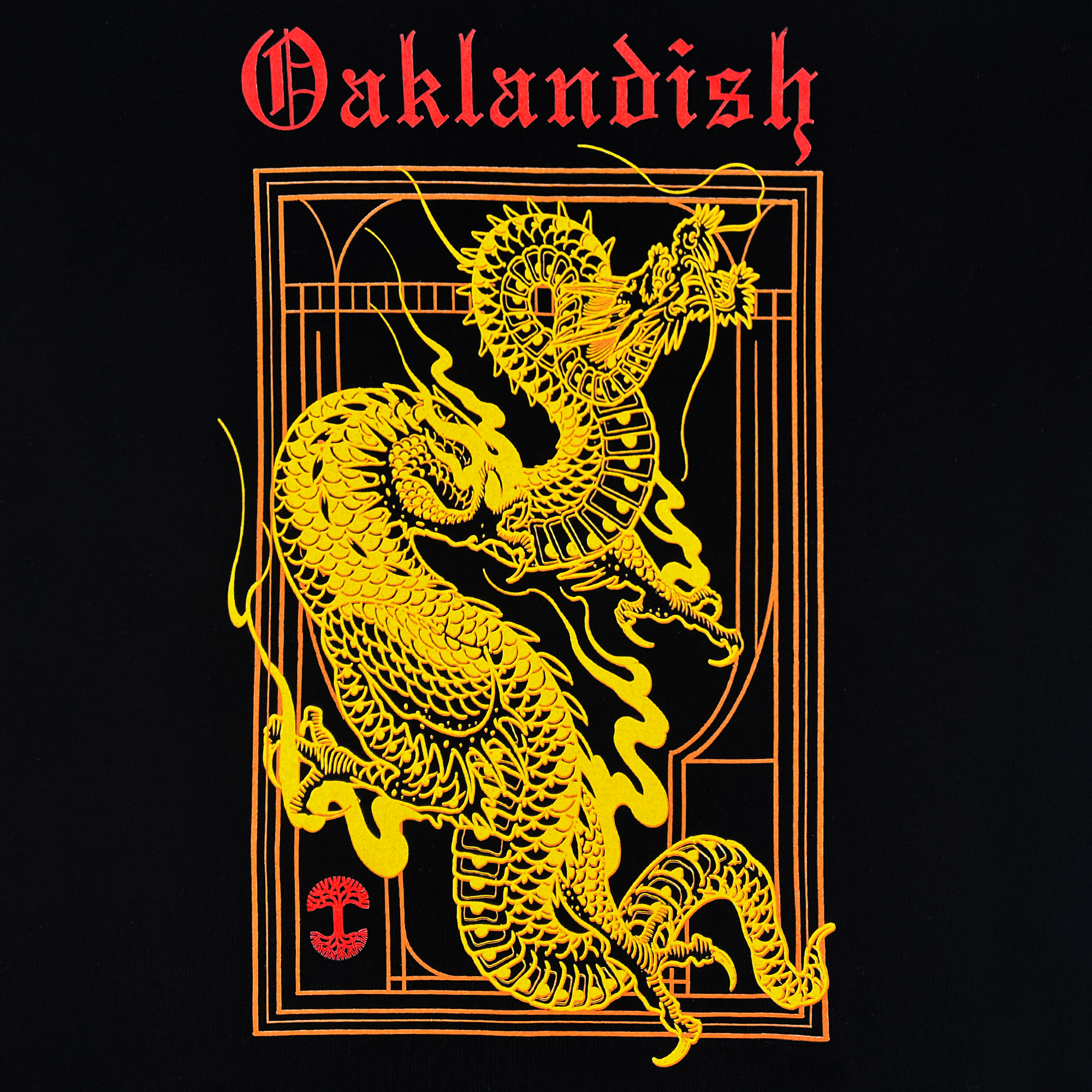 The Women's Prosperity Tee by Oaklandish showcases a stunning design with a golden dragon, representing prosperity, alongside a fierce tiger set against a black background adorned with a geometric border. The dragon is depicted in a coiled position, while the tiger is captured mid-pounce. The word "Oaklandish" appears at the top in red stylized text, accompanied by a small red symbol at the bottom.