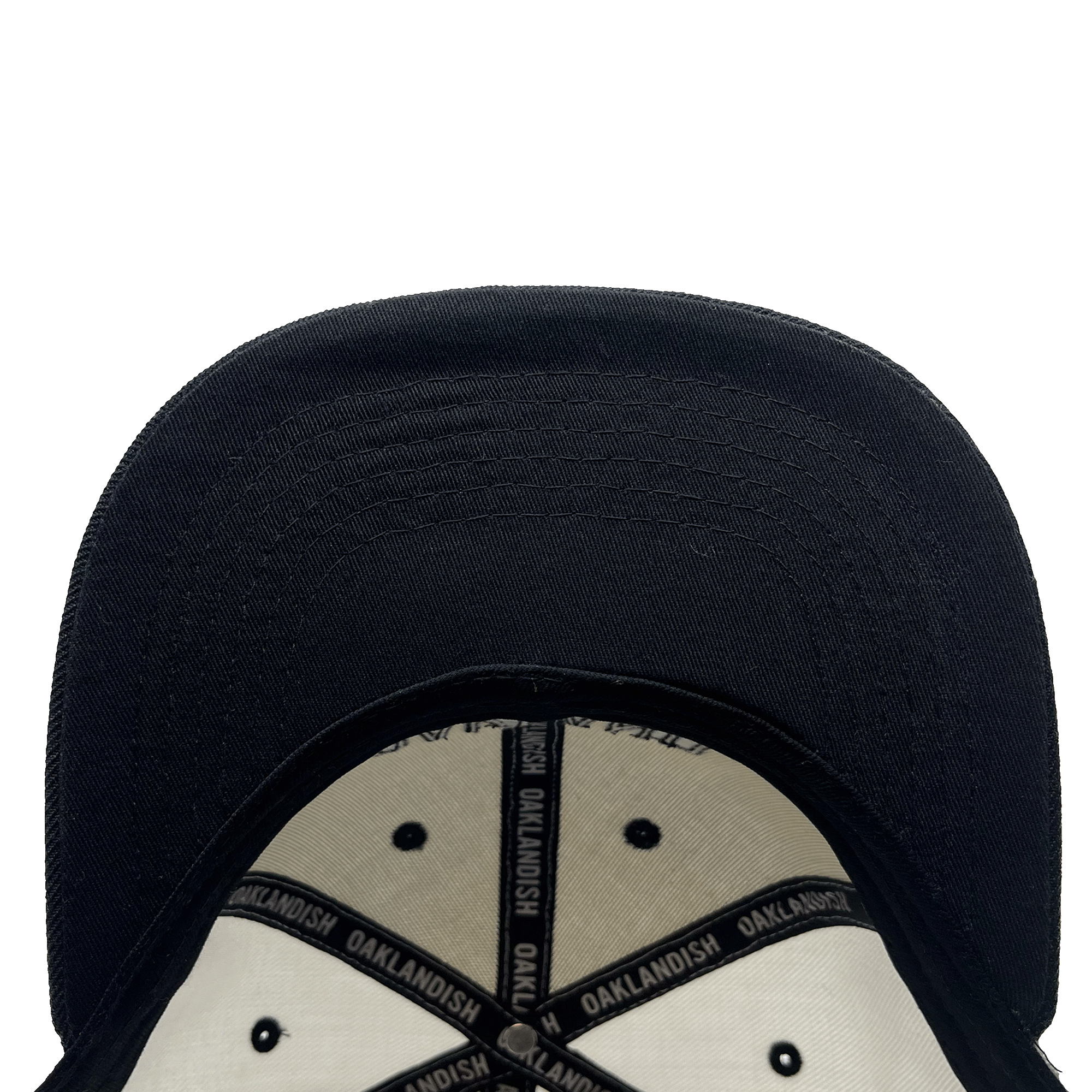 Underside view of flat, square bill on a white snapback hat.