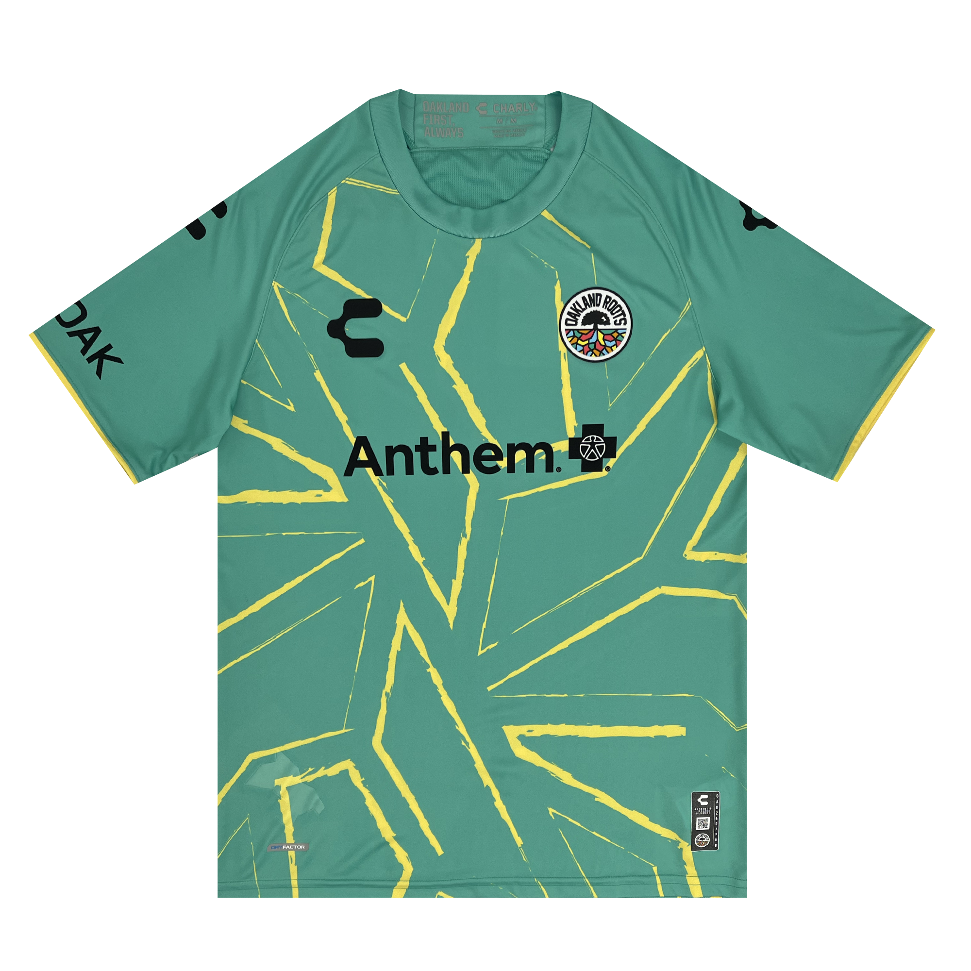 The Unisex Oakland Roots SC Goalkeeper Kit features signature green colors and a bold, abstract yellow mosaic pattern that resembles shattered glass lines. The front prominently displays "Anthem" as the central sponsor logo in black, while the upper left chest showcases a circular black-and-white emblem with a figure and text. Black logos adorn the shoulders for added detail.