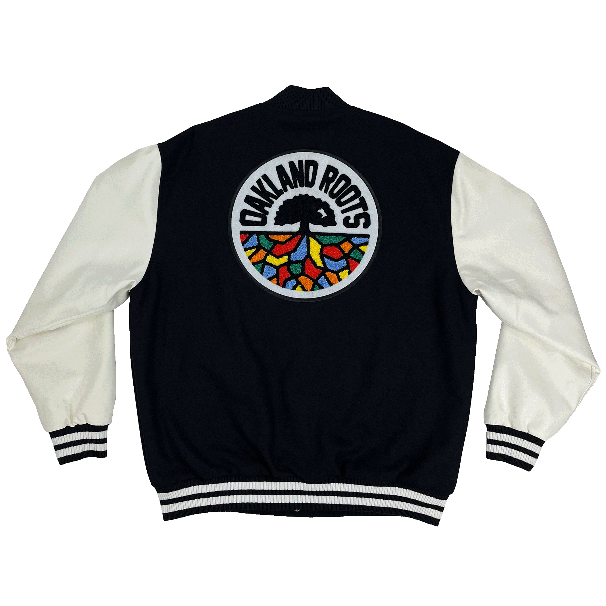 Backside view of a black varsity jacket with white sleeves and black and white striped trim with a large full-color Oakland Roots logo in the center of the back.