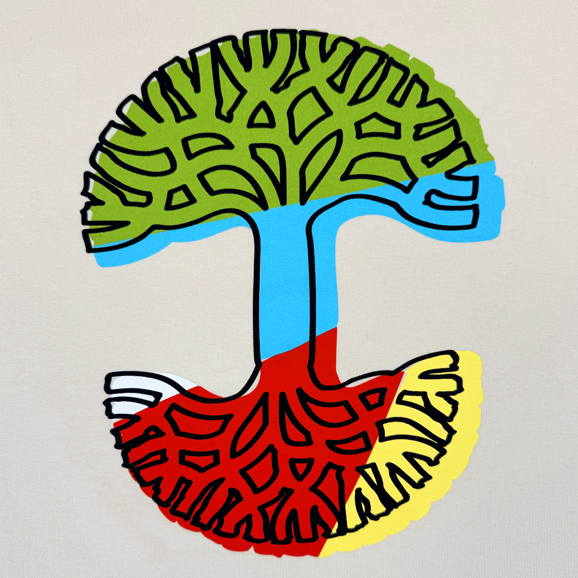 The Scrawl Tee by Oaklandish features an abstract mushroom cross-section with maze-like lines, green cap, blue stem, and red-yellow gills on heavy-weight cotton in off-white. Classic fit men's t-shirt.