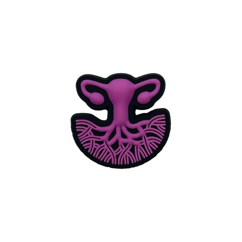 Purple and black shoe charp with Oaklandish tree roots and  Isha logo.