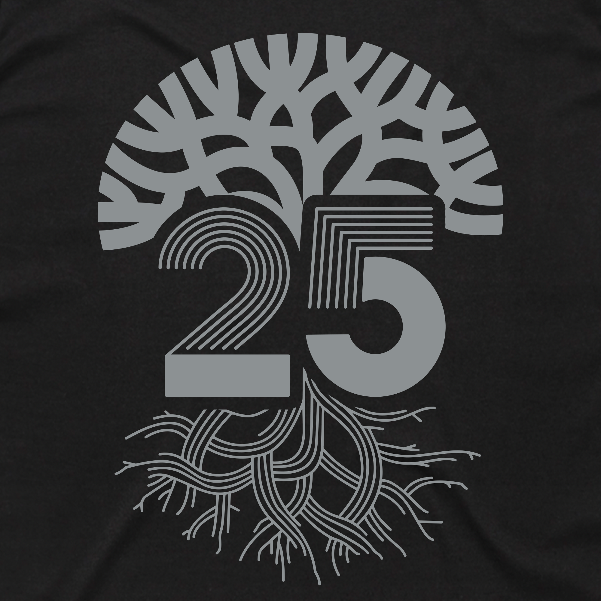 A bold gray tree with "25" in its roots symbolizes growth on the Oaklandish Silver Anniversary Tee, celebrating 25 years. The striking design pops on black—perfect for showing Oakland pride.