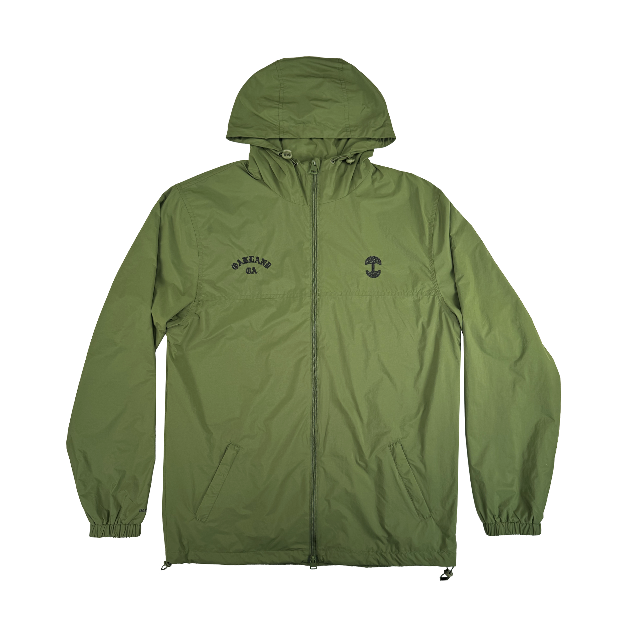 The Oaklandish Susurrus Track Top is a lightweight olive green nylon jacket with a classic fit, hood, front zipper, elastic cuffs, and two side pockets. Features include a small black left-chest graphic and "CAKELAND" logo on the right.