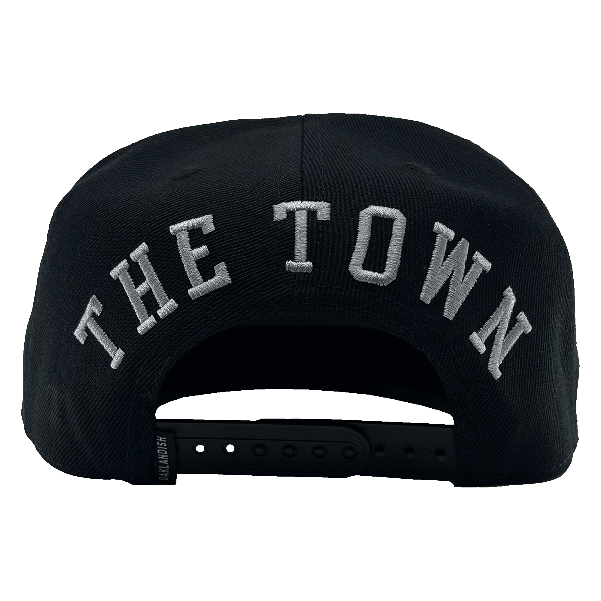 Back view of black hat with a black snapback closure with small Oaklandish tag and large grey embroidered The Town wordmark.