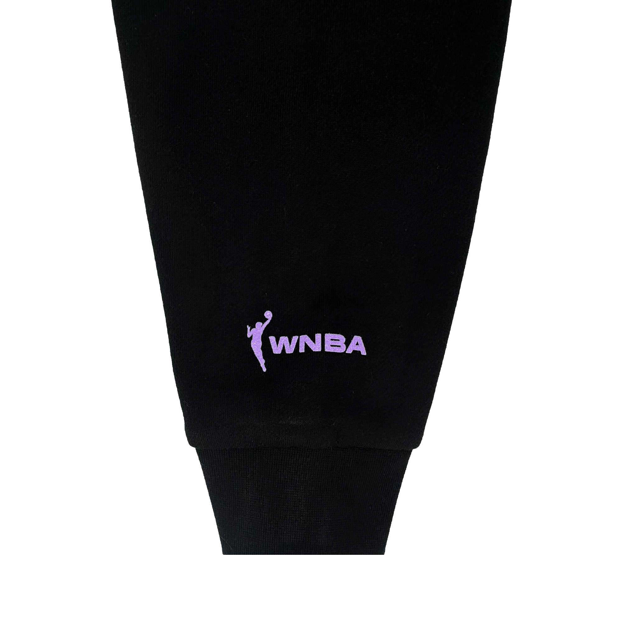Close-up of a black Odin Hoodie sleeve cuff by GSV, showing the lavender WNBA logo and embroidered text near the wrist. Officially licensed unisex apparel with a stylized figure and “WNBA.” Plain light gray background.