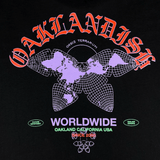 Close-up of red, purple, and green Oaklandish worldwide graphic on the back of a black t-shirt.