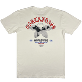 The backside of a natural cotton color t-shirt with a large Oaklandish worldwide graphic.