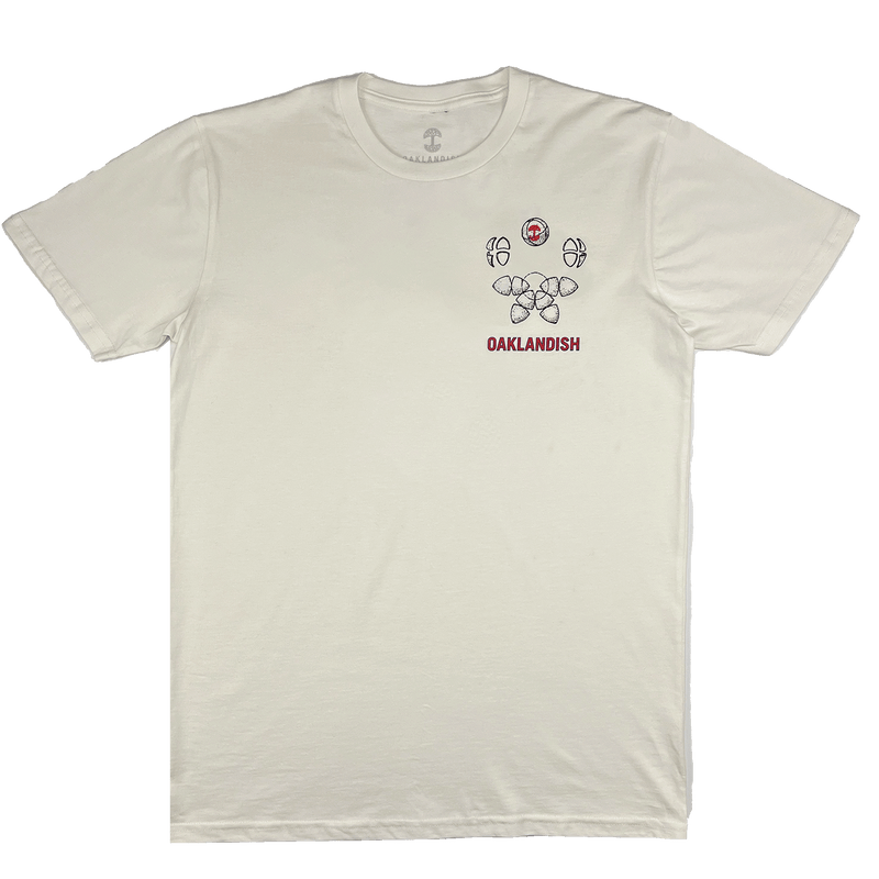 Front view of a natural cotton t-shirt with small Oaklandish worldwide graphic on the left chest wear side.