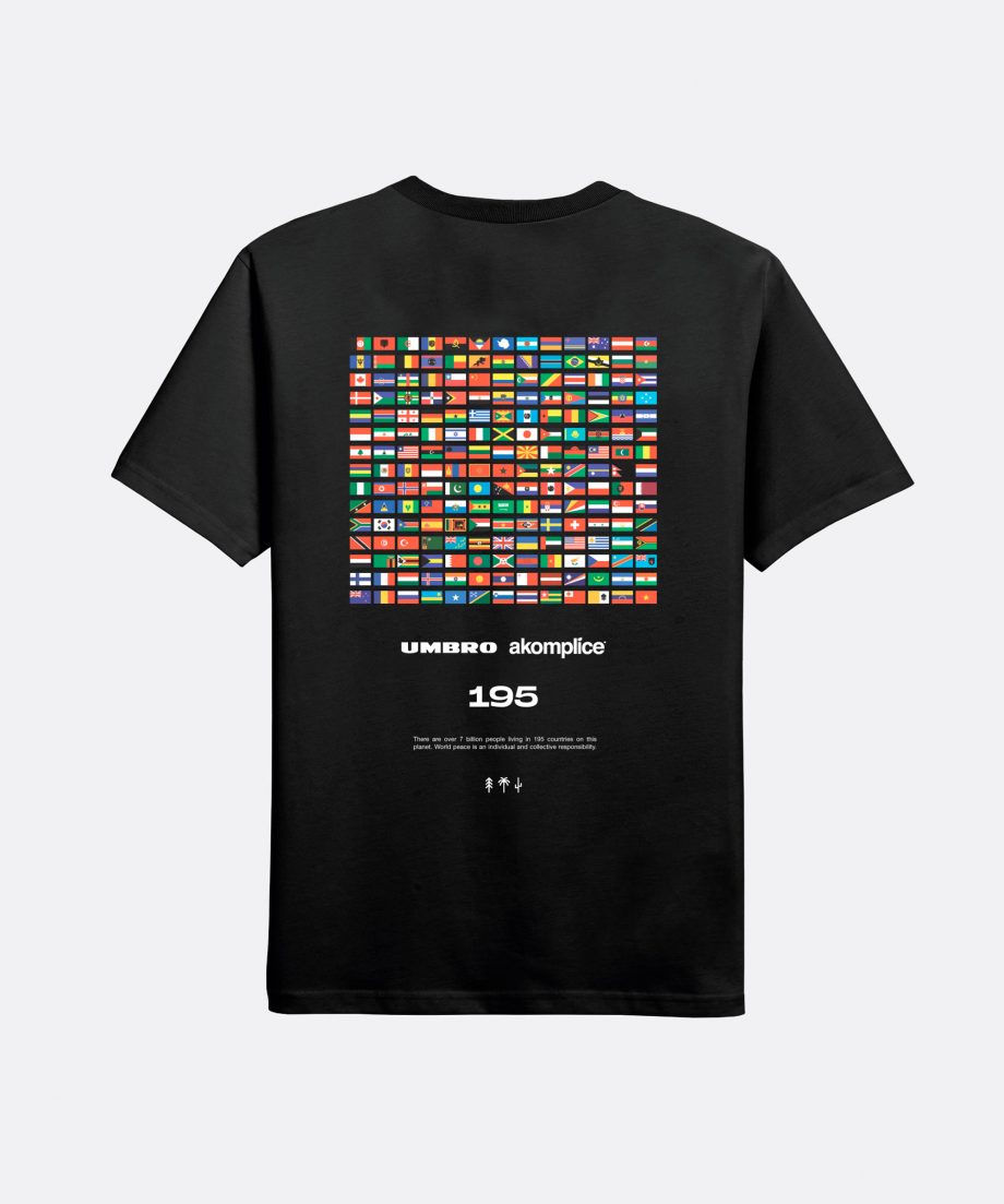 Back image of short sleeve black t-shirt with screen printed image of 195 flags from countries of the world text underneath graphic reads ' Umbro , Akomplice 195 there are over 7 billion people living in 195 countries on this planet. World peace is an individual and collective responsibility'.