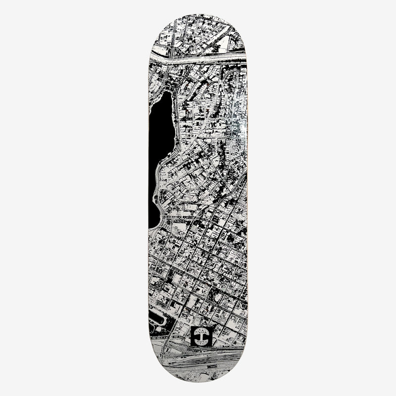 Skate deck with an aerial view photo of east of Lake Merritt in black and white.
