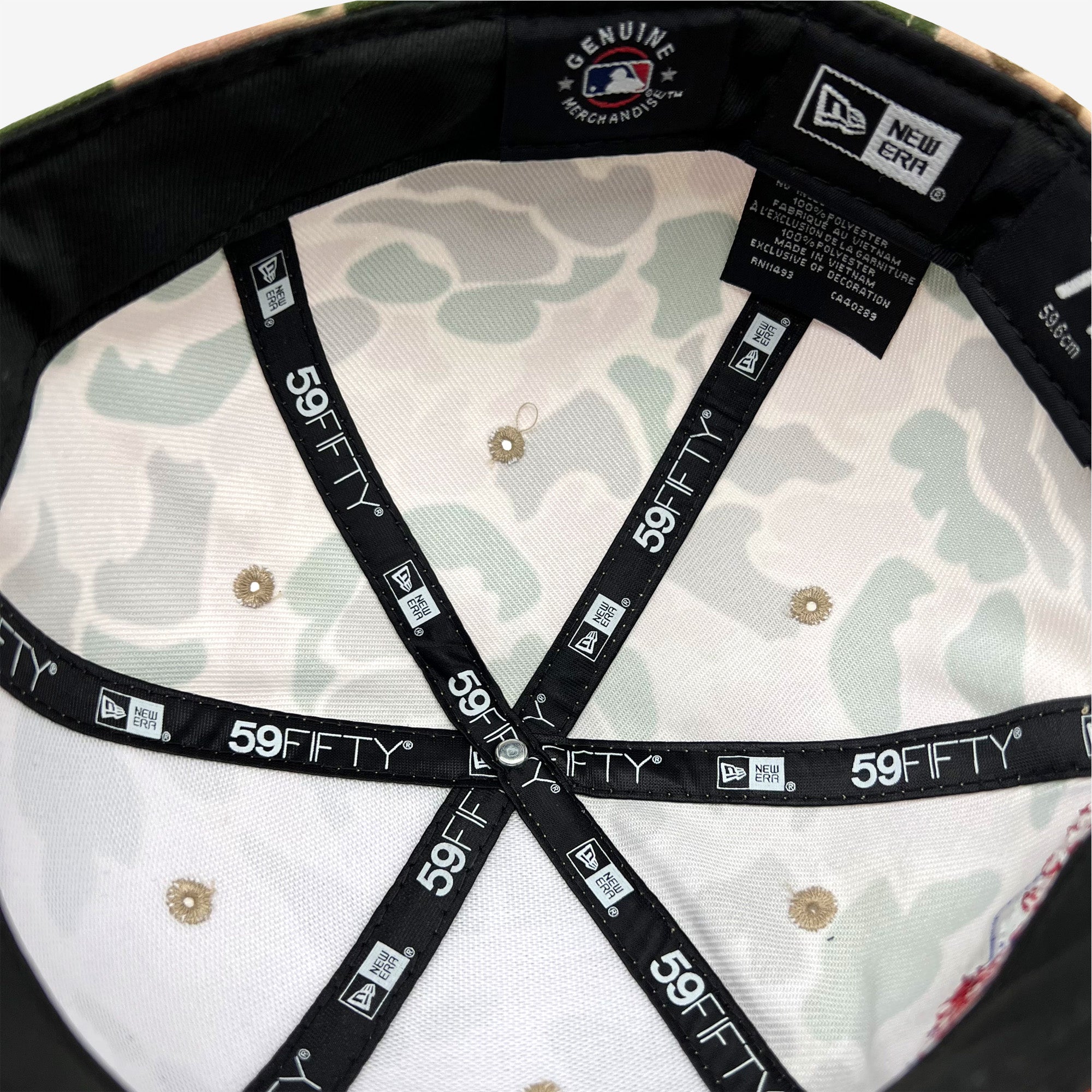Detailed view of the inside of the crown of a fitted cap with New Era 5950 taping.