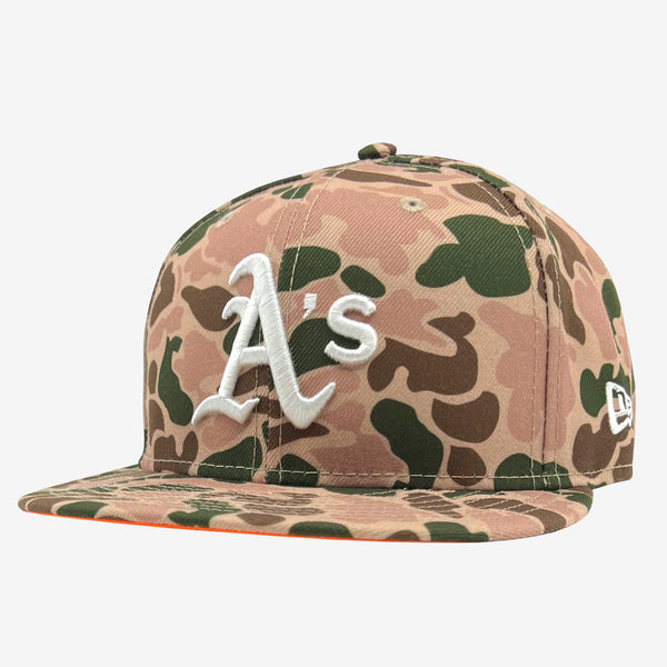 Front and side view of duck camo cap with an embroidered As logo on the crown and New Era logo on the left wear side.