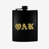 Black stainless steel flask with gold OAK wordmark in bleeding old school font.