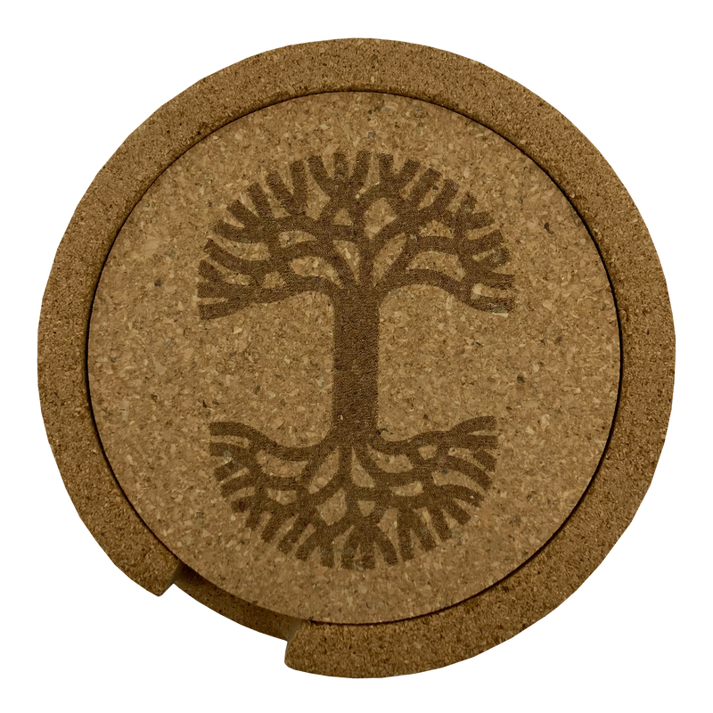 Top view of a set of 6 round cork coasters with darker brown Oaklandish tree logo in cork holder.
