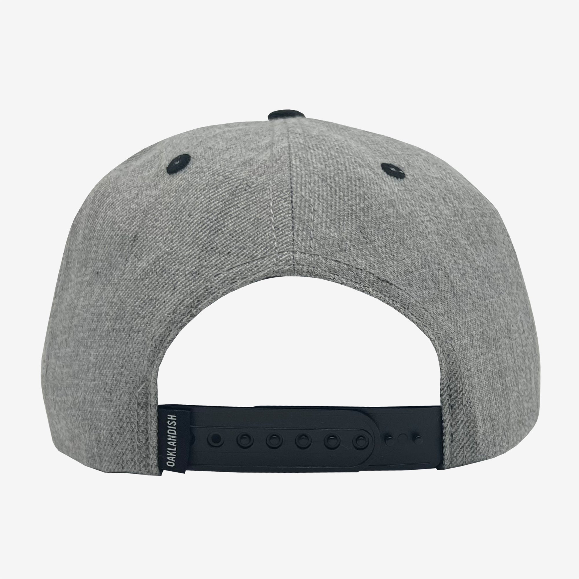 Back of grey cap with black plastic snap back adjustable closure.