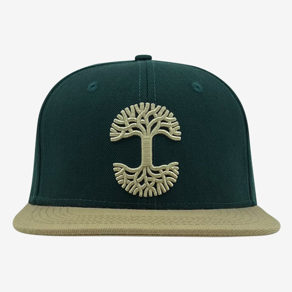 Forest snapback hat with khaki embroidered Oaklandish tree logo on crown and contrasting khaki brim.